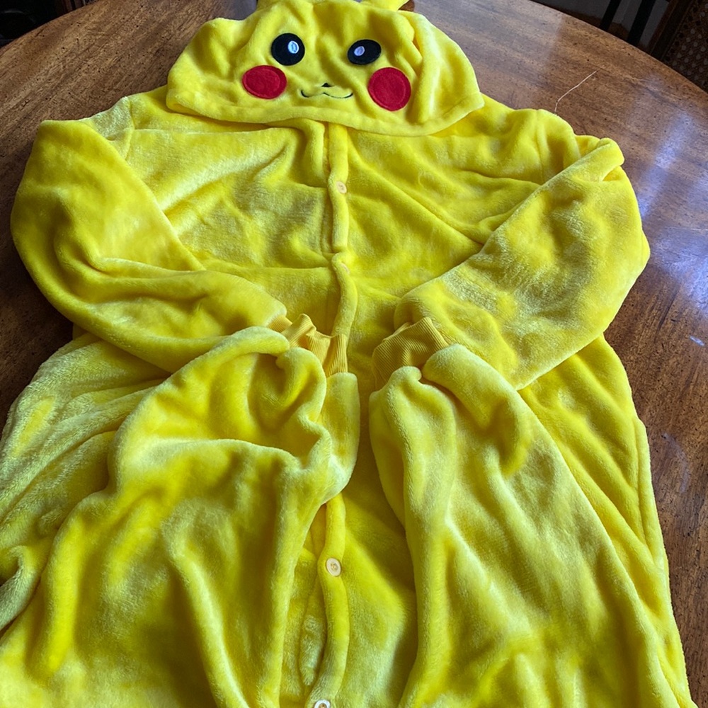 Pikachu plush button-up, onesie costume with pockets. Great condition